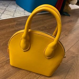 Just an yellow mini purse